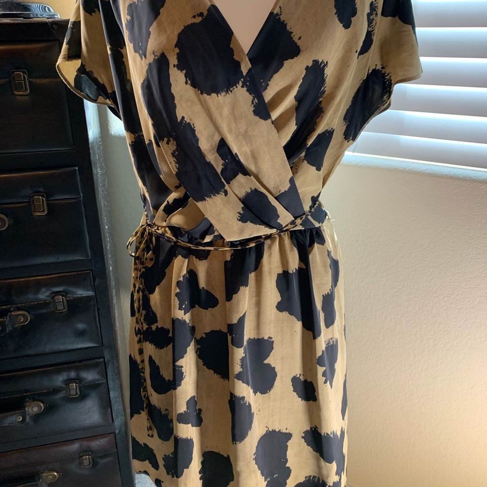 Tan and black Rachel Roy with a little wrap.